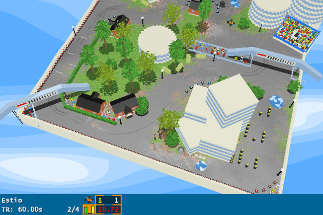 Captura de tela de uma pista de corrida de automóveis e edifícios de cima.