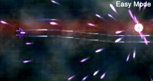 Snímka obrazovky kozmickej lode strieľajúcej nepriateľov v homebrew hre Silveredge