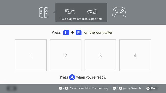 A tela de conexão do controle no Nintendo Switch.