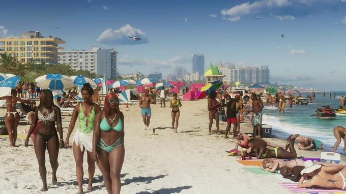 Posnetek zaslona Grand Theft Auto 6, ki prikazuje množice ljudi in živali na plaži