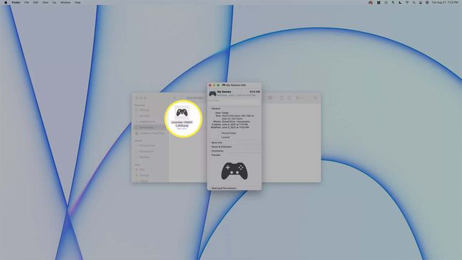 „Mac“ kompiuteryje įklijuotas aplanko vaizdas.