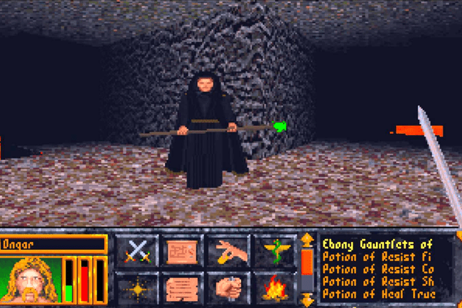 Captura de pantalla de un hechicero con un bastón brillante.