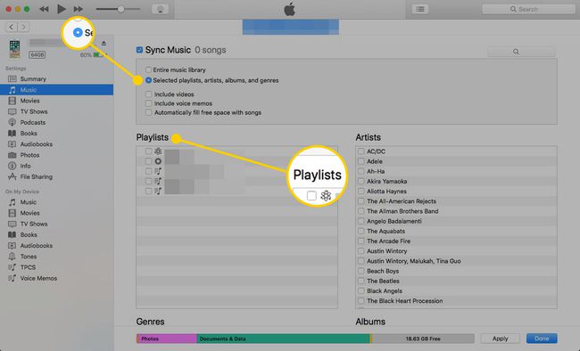 Ekran muzyki w iTunes z podświetlonym przyciskiem Wybrane listy odtwarzania