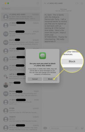 النافذة المنبثقة لتأكيد الحظر في تطبيق الرسائل على جهاز Mac.