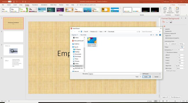 Een schermafbeelding met de functie Achtergrondafbeelding invoegen in PowerPoint.
