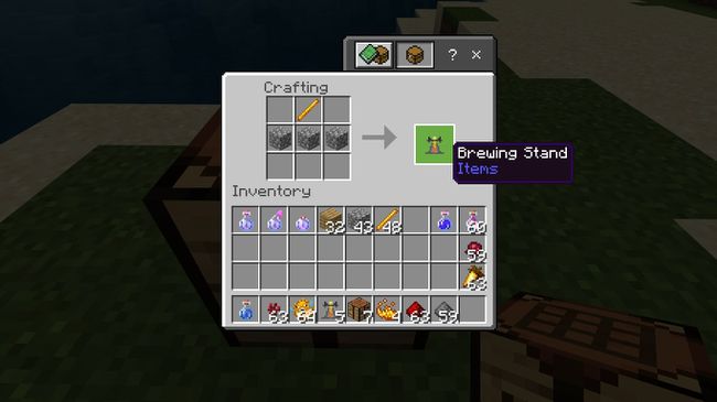 上の列の真ん中にブレイズロッドを置き、2番目の列に3つの石畳を置いて、醸造スタンドを作ります。