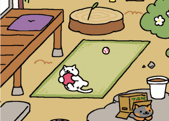 Juego Neko Atsume; gato sosteniendo la pelota