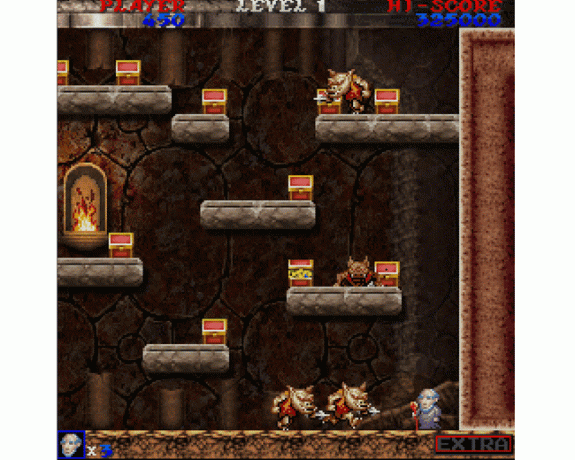 Zrzut ekranu przedstawiający skrzynie ze skarbami i ogry na różnych poziomach i platformach.