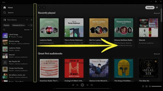 Le séparateur de la barre latérale est mis en surbrillance avec une flèche pointant vers la droite pour indiquer la direction à faire glisser pour redimensionner la barre latérale dans Spotify.