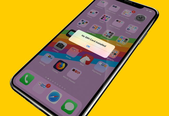 画面にSIMカードがインストールされていないiPhoneXメッセージ