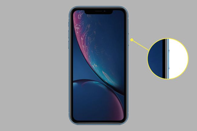 O botão lateral em um iPhone XR