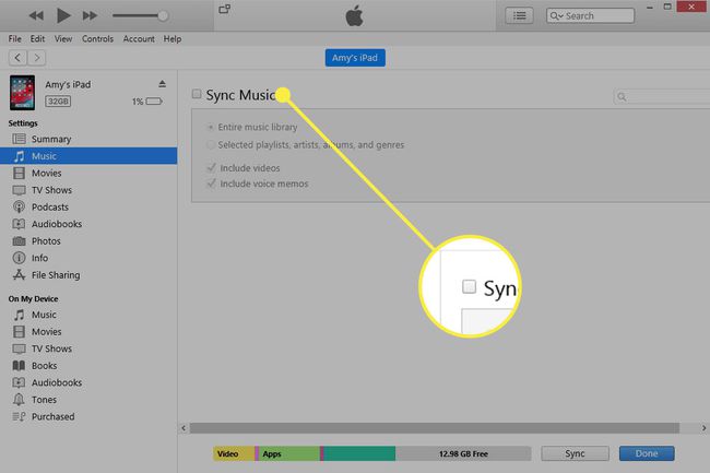 iTunes مع تمييز خيار مزامنة الموسيقى