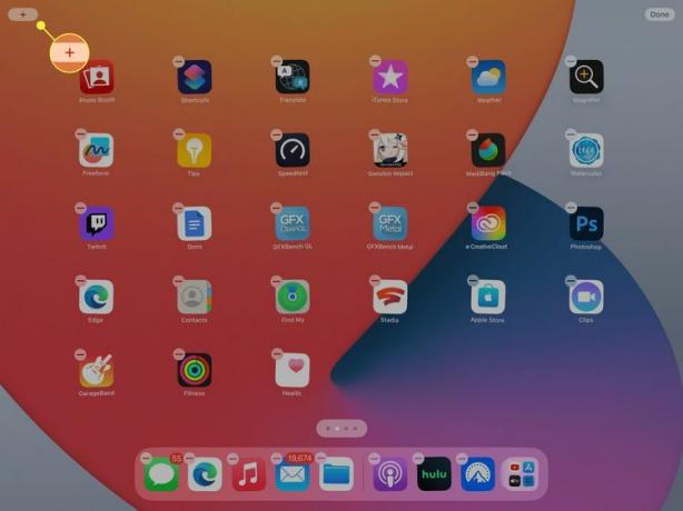 O botão de mais (+) destacado na tela inicial de um iPad.