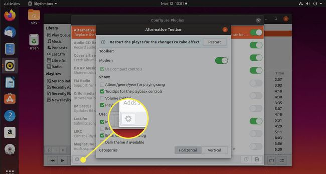 Скриншот плагинов Rhythmbox с выделенным значком шестеренки
